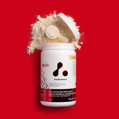 ATPLab Performance vanilla protein powder container with scoop on a red background available at Healthsupp