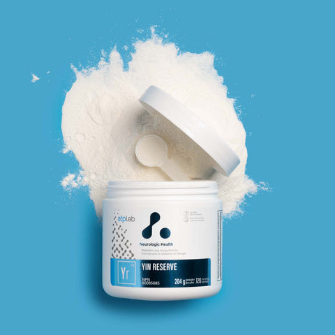 Open container of YIN RESERVE powder by ATP Lab with a blue background available at Healthsupp