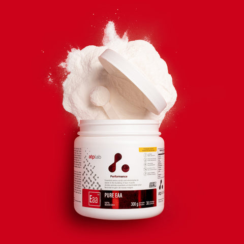 Container of EAA powder Pineapple coconut flavor by ATP Lab with a red background available at Healthsupp