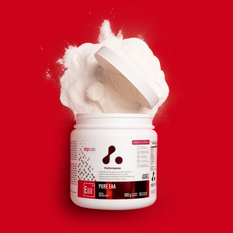 Container of EAA powder Raspberry flavor by ATP Lab with a red background available at Healthsupp