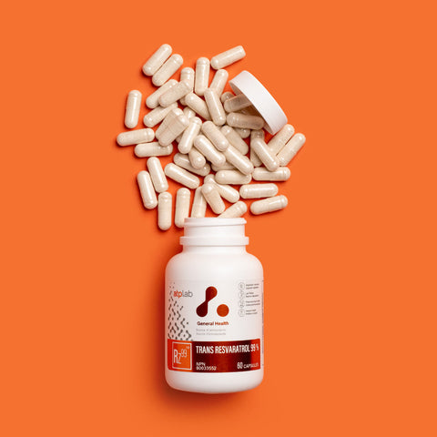 TRans Resvaratriol 99% supplement bottle by ATP LAB with some pills on an orange background available at Healthsupp