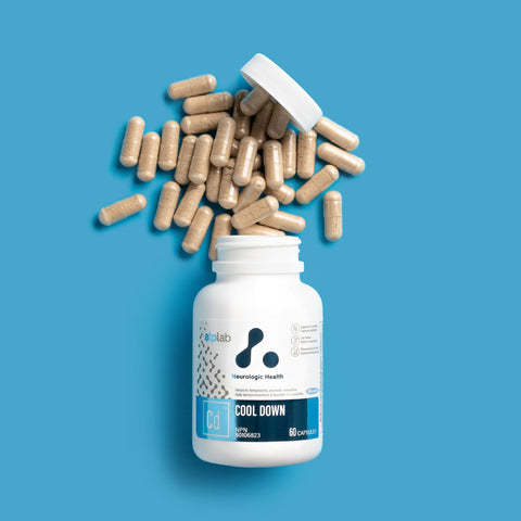 Cool Down Supplement bottle by ATP Lab with open lid and scattered capsules on a blue background available at Healthsupp