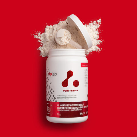 ATPLab Performance strawberry protein powder container with scoop on a red background available at Healthsupp